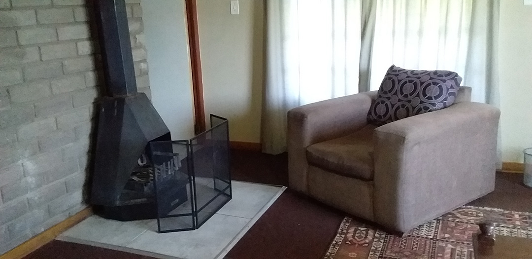 Family Room lounge sofa fireplace cosy Alpine Swift Trails 