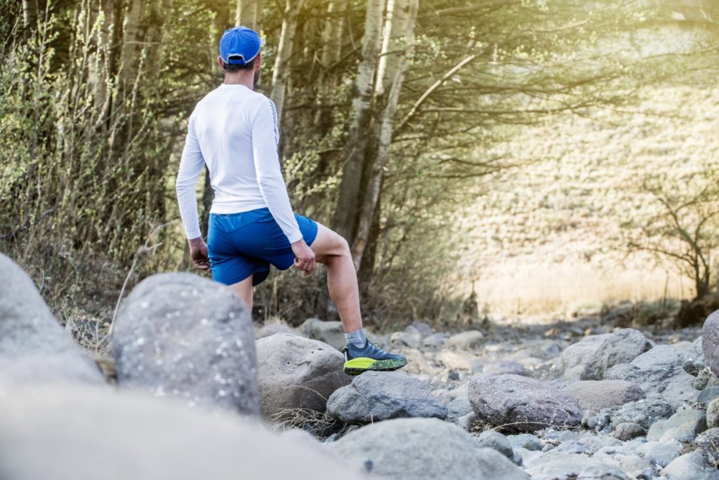 Hylton Dunn standing near Bell River on course trail running Alpine Swift Trails